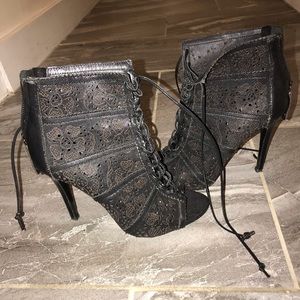 Alice and Olivia black lace up bootie.